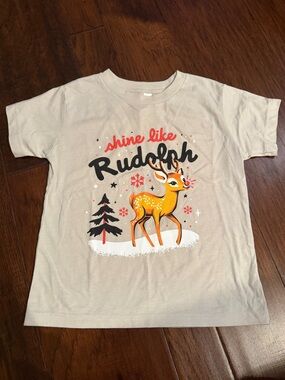 Bella Canvas Beige Kids 'Shine Like Rudolph' Graphic Tee with Orange Deer